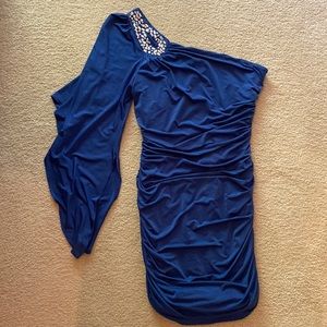 Royal blue one shoulder dress.